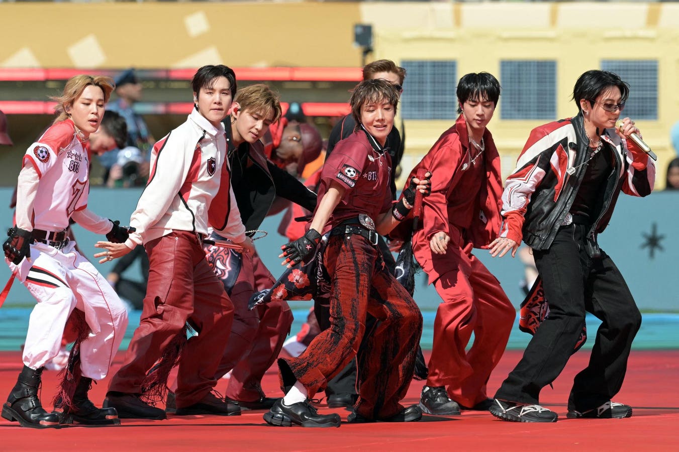 In a colorful, historic halftime World Cup show, KPop sensations BTS stormed the stage, bringing a classic track to more than 80,000 fans in a packed 