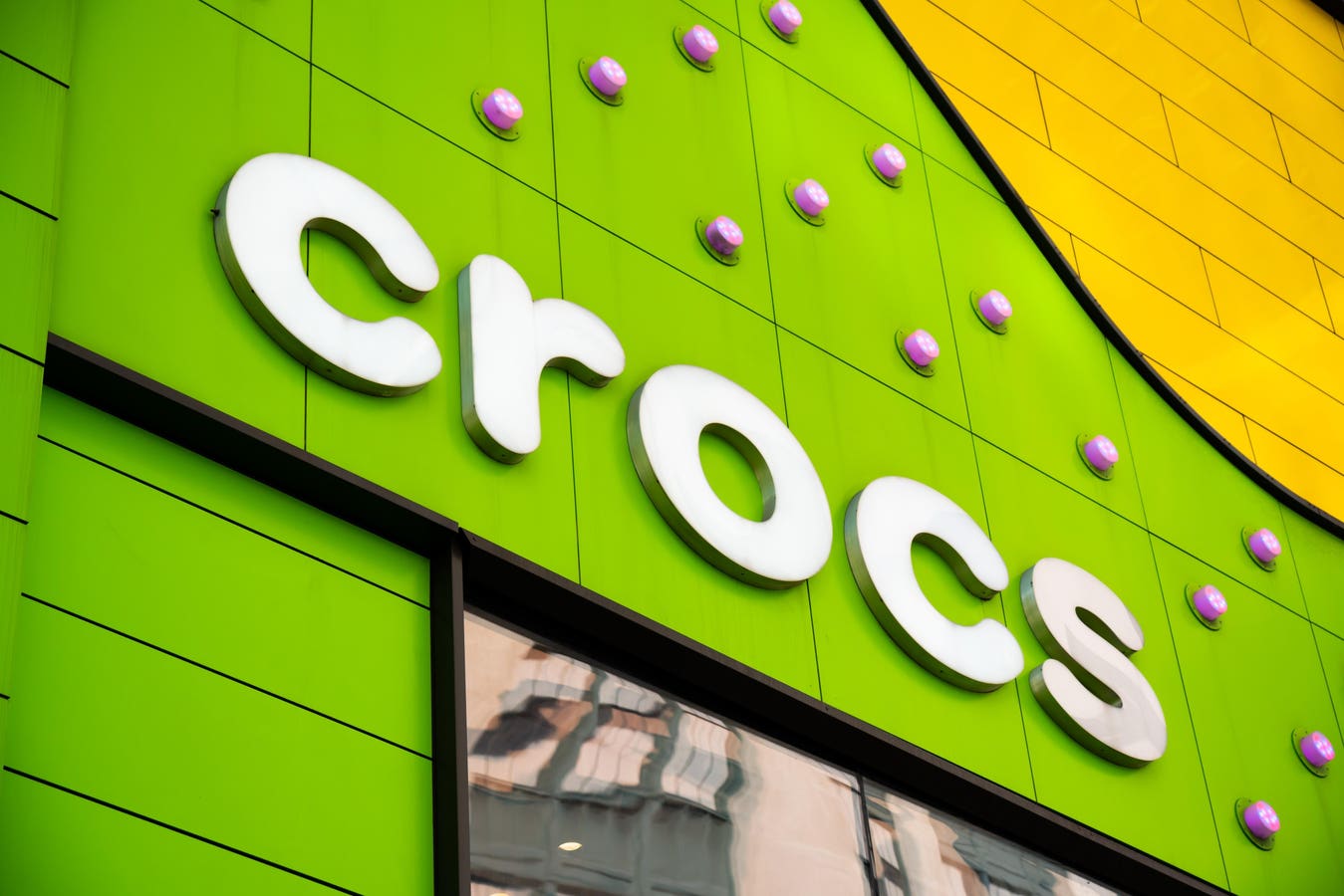 Crocs expects to hit the $500 million milestone in sandal sales this year as it leverages its iconic clog and looks to attract new generations of cons