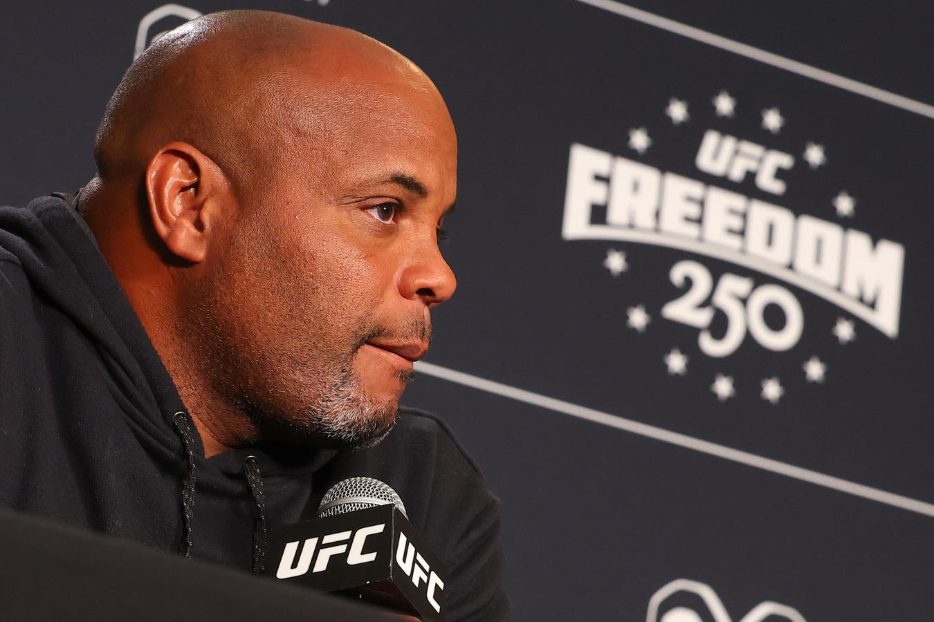 UFC analyst Daniel Cormier ripped Josh Hokit's Michelle Obama insult at UFC Freedom 250 as gross and disgusting, arguing the White House stunt divided