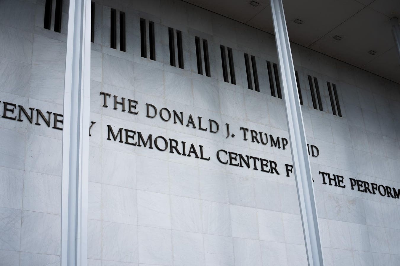 President Donald Trump’s name still appears on the exterior of the Kennedy Center as of Monday afternoon as a court deadline to remove it approaches.
