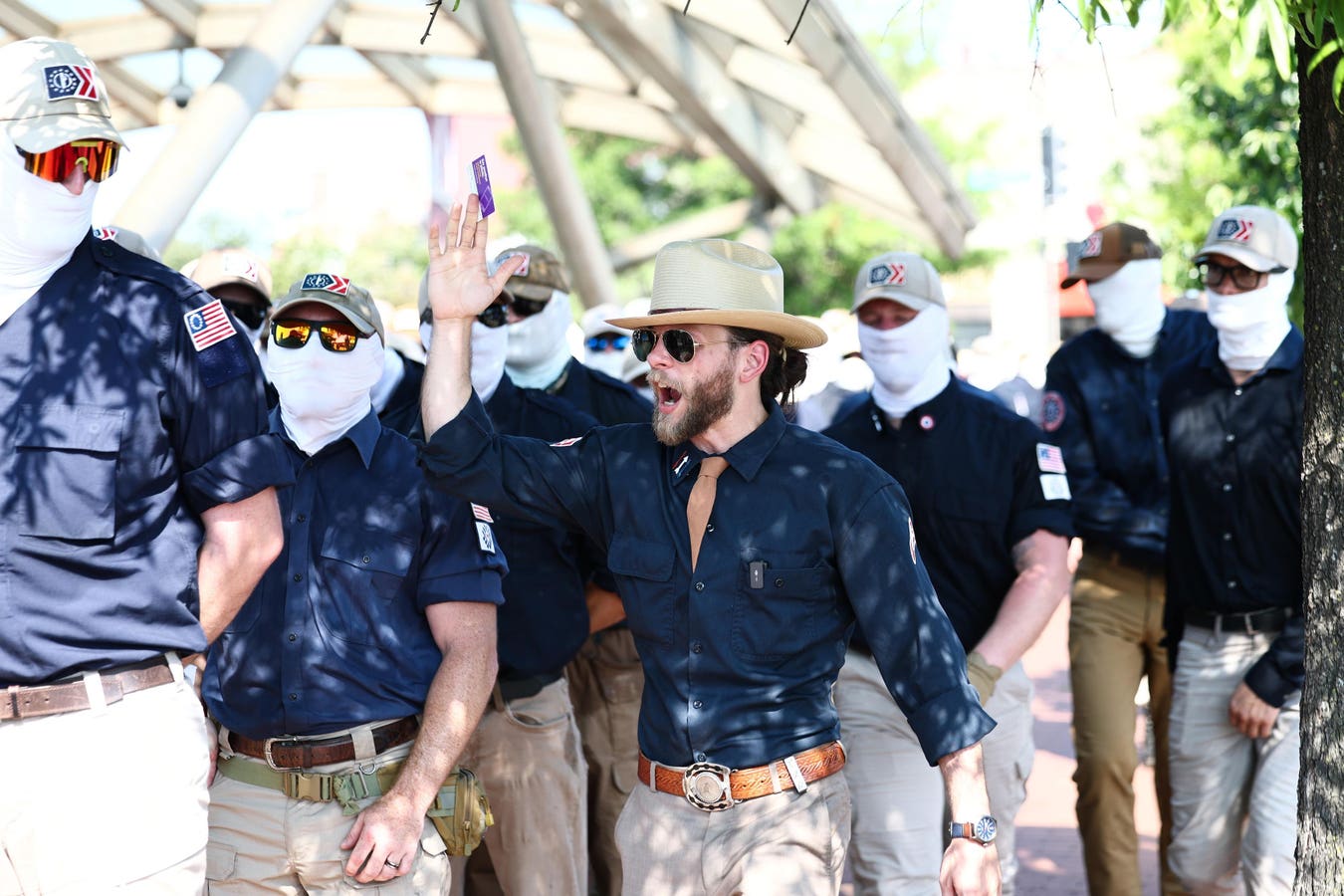 The men were clothed in outfits associated with white nationalist organization Patriot Front.