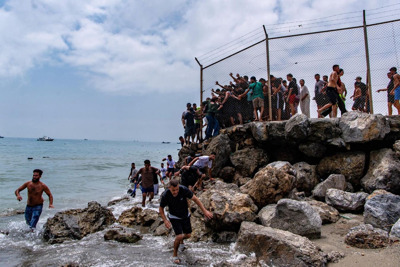 Videos of migrants pouring into Spain’s Ceuta territory have gone viral on X, prompting criticism from Elon Musk and European politicians critical of 