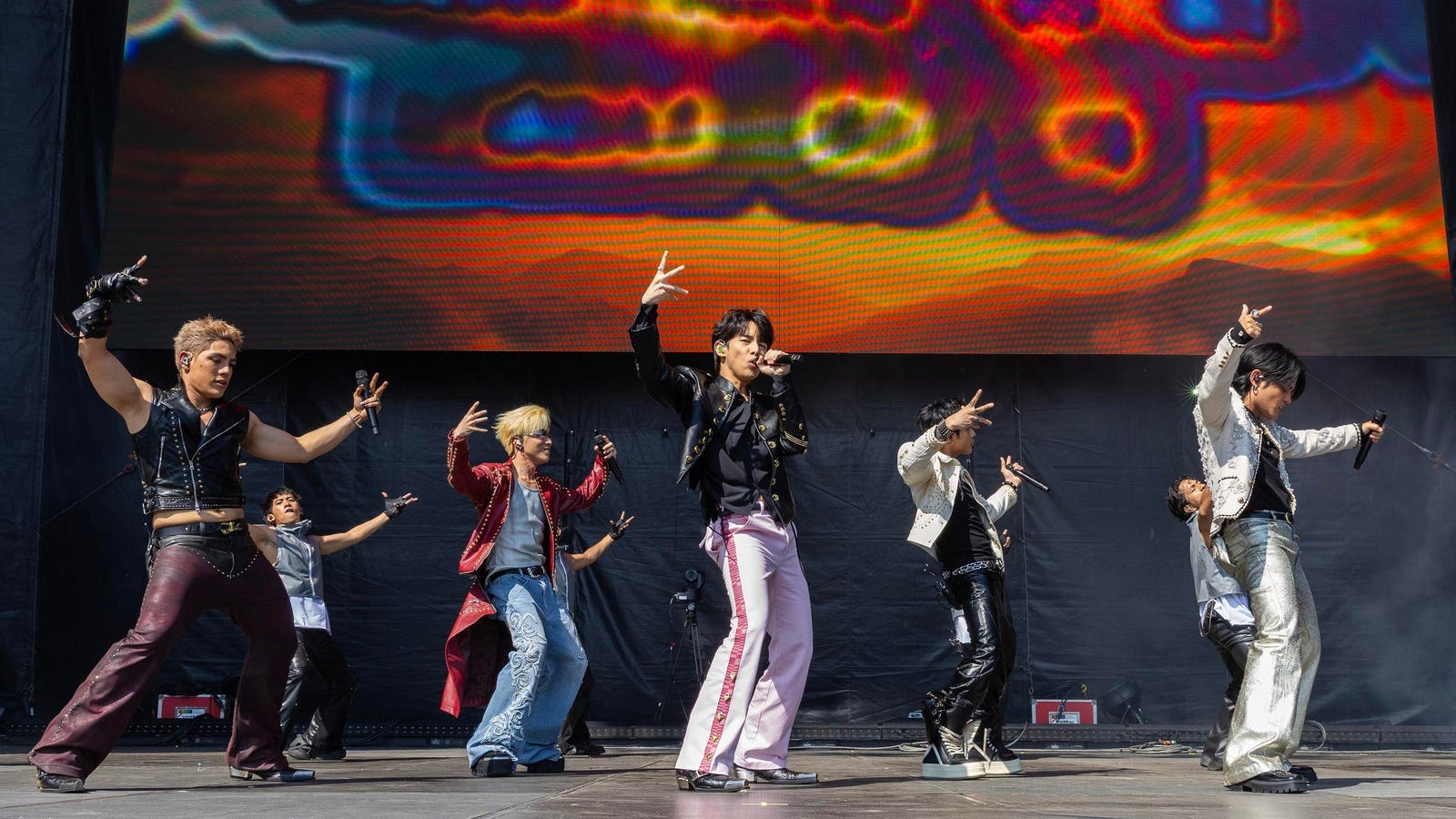 Lollapalooza began Thursday in Chicago with a historic performance from Filipino boy band SB19 plus sets by sombr, Wet Leg, John Summit, Empire of the